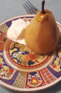 Poached pear prepared with hojicha green tea.